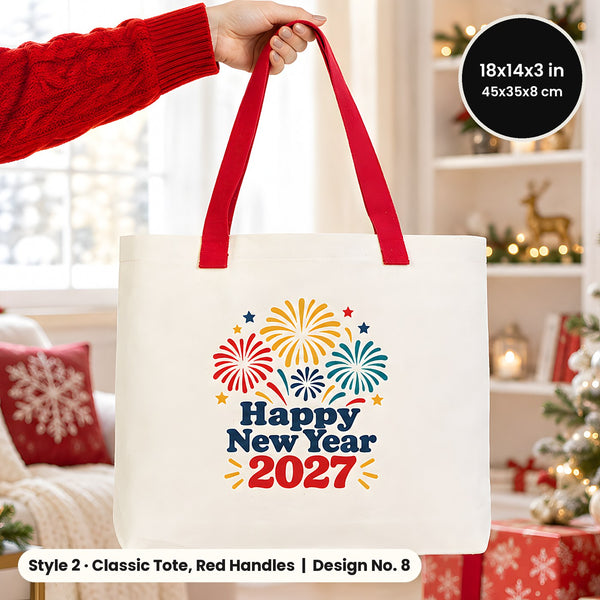 Hand in a red knit sweater holding a natural canvas tote bag with red woven handles printed Happy New Year 2027 with fireworks