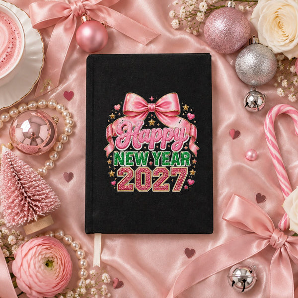 Black canvas notebook with a pink bow Happy New Year 2027 print on blush pink satin with pink ornaments, pearls and roses