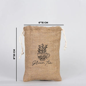 Jute bag with 'Green Tea' text and measurements on a light gray background