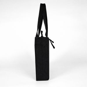 Zijaanzicht van een zwarte gabardine draagtas met lange handvatten - Pamusan.nl