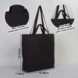 Black tote bag with measurements and fabric details on a gray background