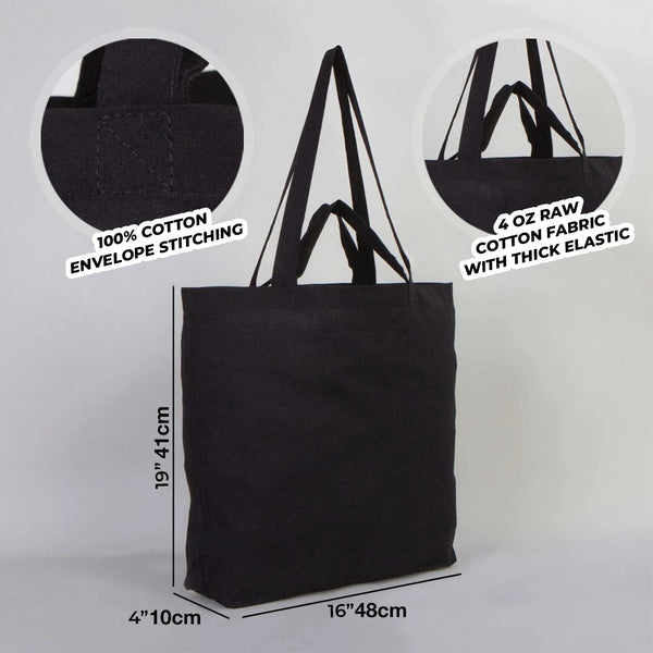 Black tote bag with measurements and fabric details on a gray background
