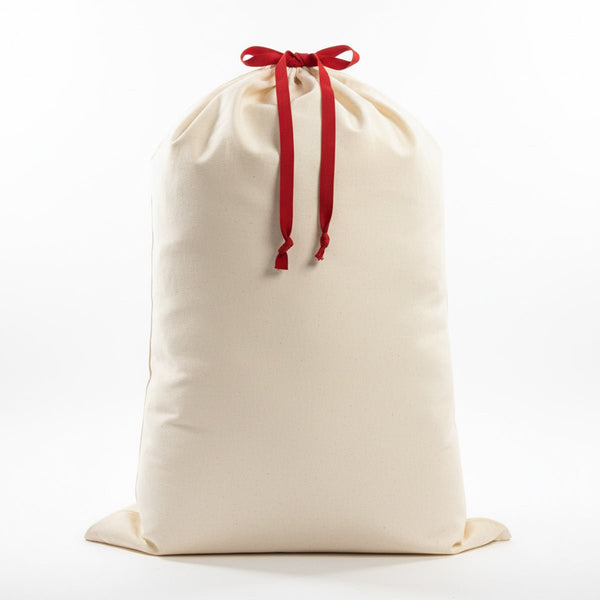 Blank Santa sack with red drawstring bow on white background, 60x90 cm plain 320 gsm canvas