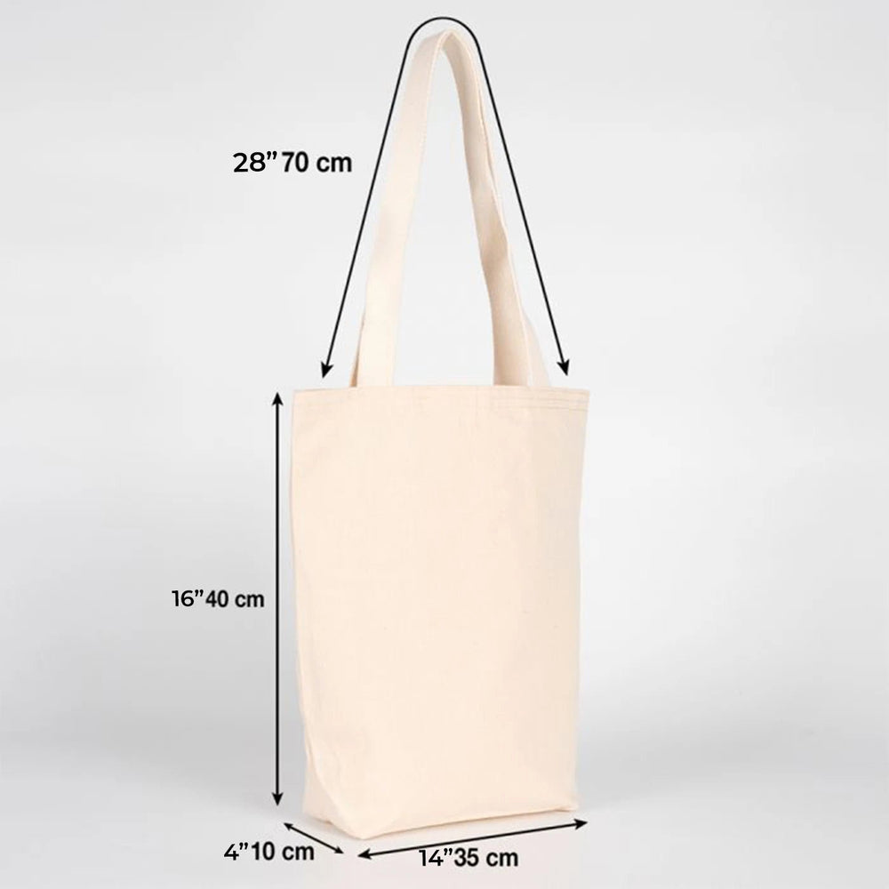 Beige tote bag on a wooden surface with dimensions displayed