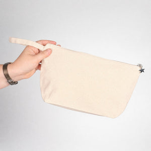 Zijaanzicht van een naturel katoenen canvas etui met bodemvouw en ritssluiting - Pamusan.nl