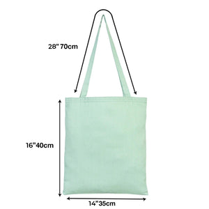 Mint green tote bag with measurements on a white background