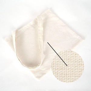 Beige fabric with a textured pattern on a white background