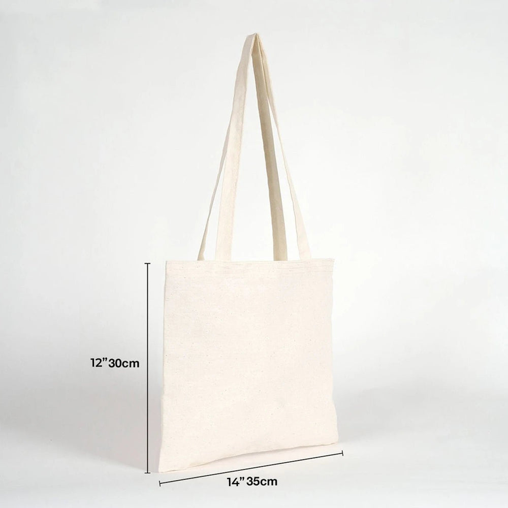 Beige tote bag on a wooden chair with size label
