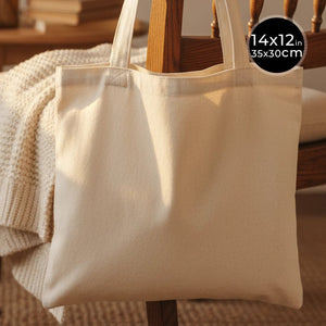 Beige tote bag on a wooden chair with size label
