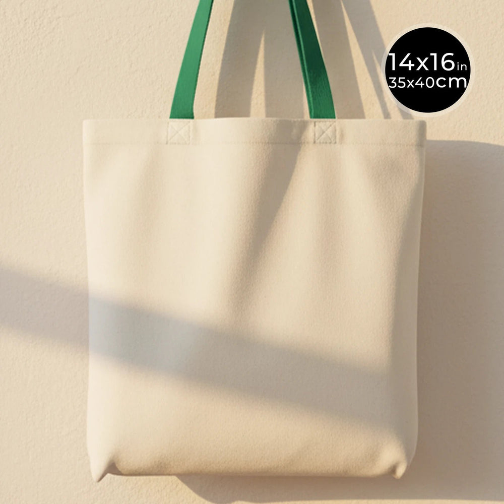 Beige tote bag with green handles on a beige background