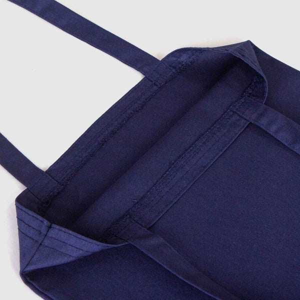 Navy blue apron on a white background