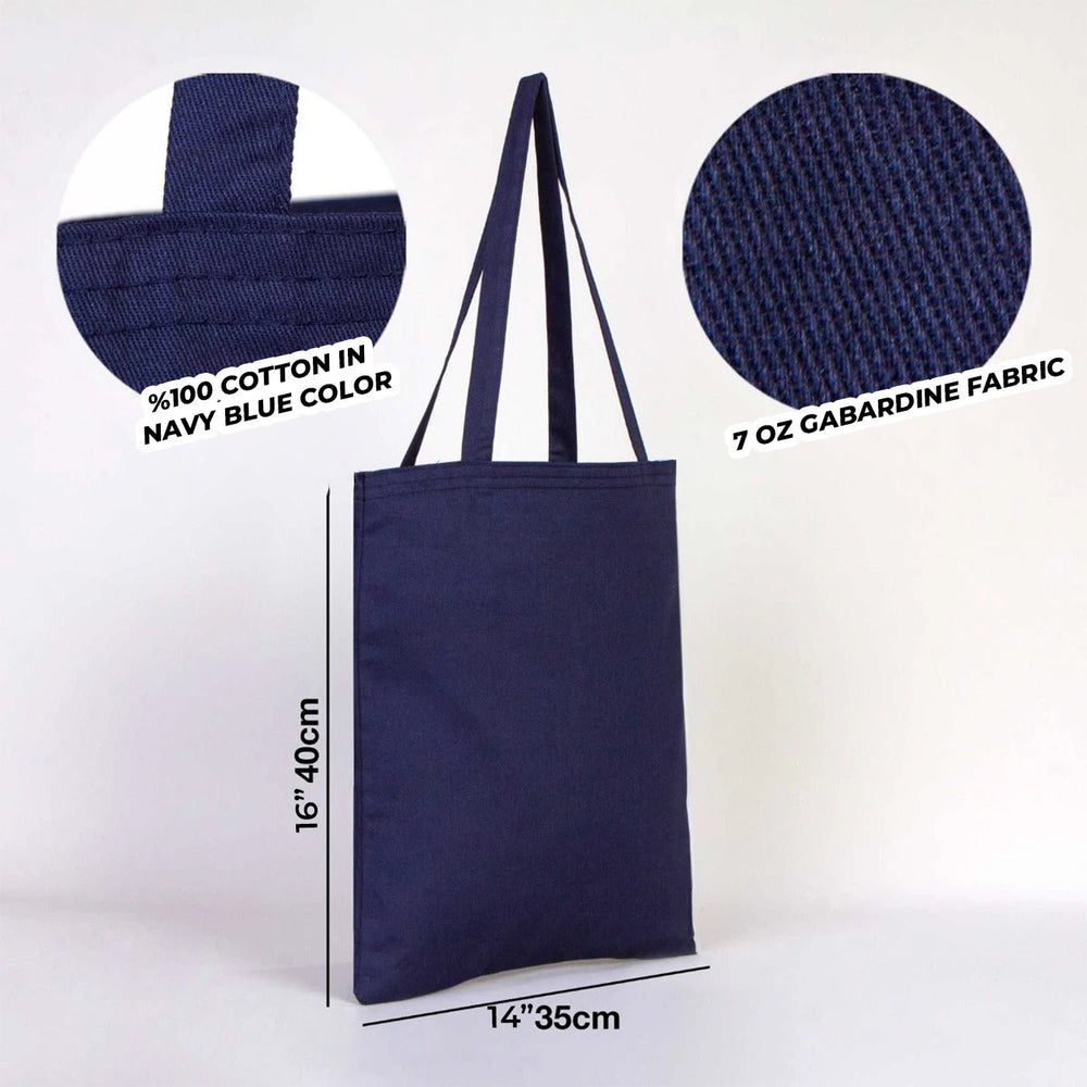 Navy tote bag held by a person with dimensions displayed