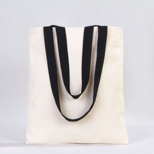 White tote bag with black handles on a light gray background