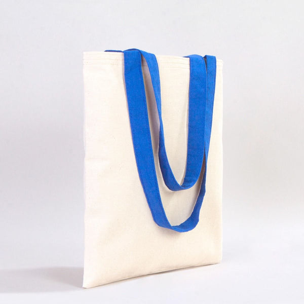 White tote bag with blue handles on a light gray background