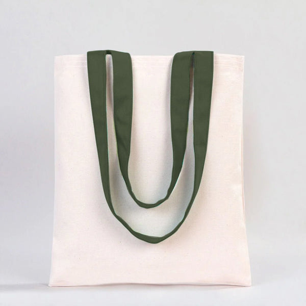 White tote bag with green handles on a light gray background