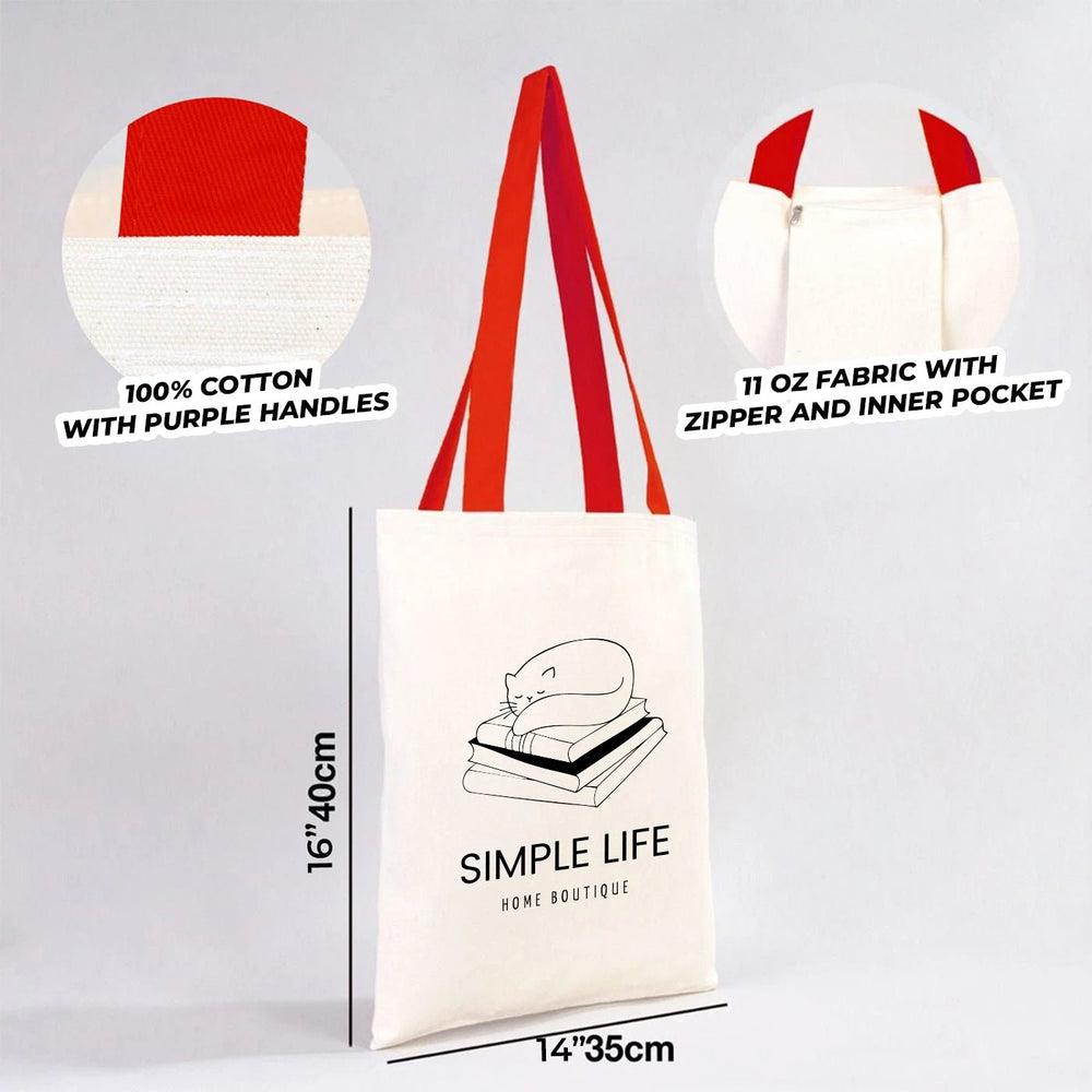 Beige tote bag with red handles on a neutral background
