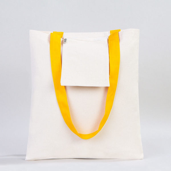 White tote bag with yellow handles on a light gray background