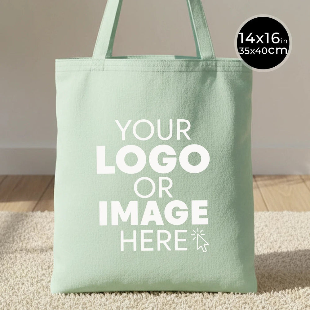 Green tote bag with customizable text area on a neutral background