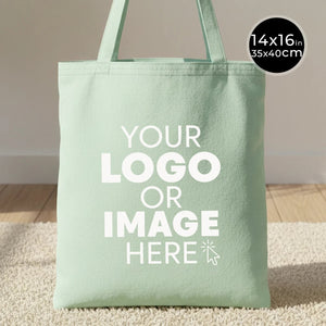 Green tote bag with customizable text area on a neutral background