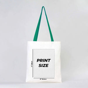 White tote bag with green strap and print size measurement on a light gray background