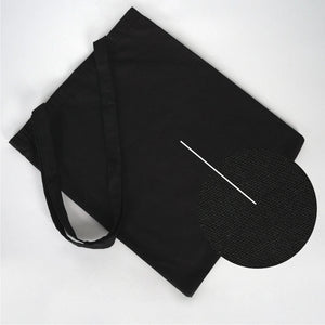 Black apron with a heart-shaped pocket on a white background