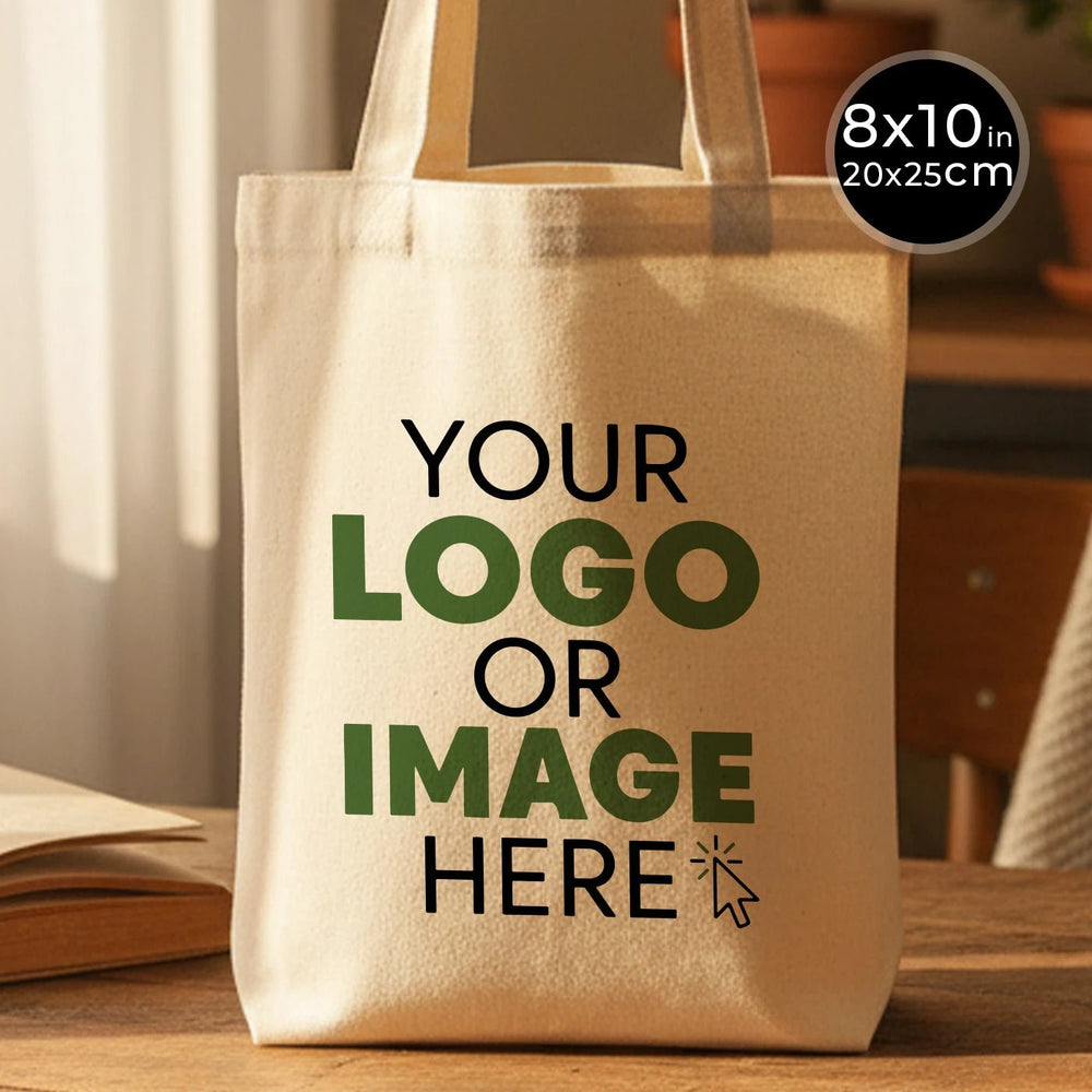 Beige tote bag with customizable text on a wooden surface