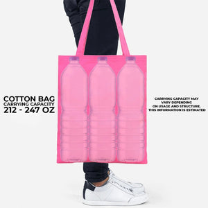 Pink cotton bag with three bottle-shaped compartments held by a person wearing white sneakers.