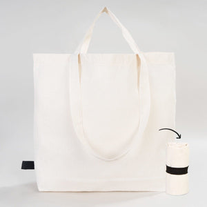 White tote bag with black accents on a light gray background