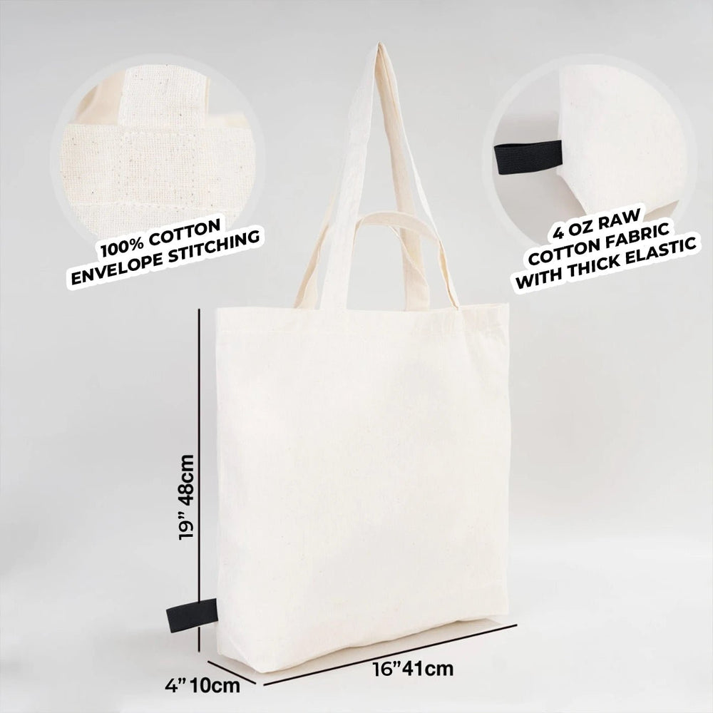Beige tote bag on a wooden surface with dimensions displayed