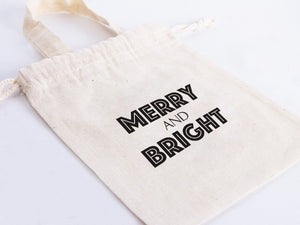 Merry and Bright Gift Bags – Custom Cotton Christmas Bags with Logo for Family or Company Gifts — logo detail | Pamusan