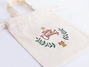 Merry Christmas Cotton Drawstring Bag – Custom Holiday Gift Pouch — logo detail | Pamusan