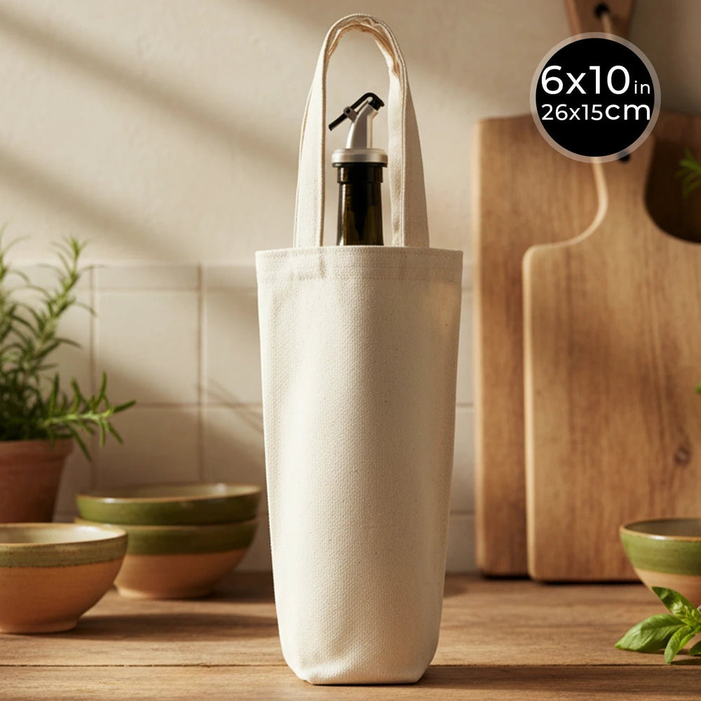 White bottle bag with a bottle inside on a wooden surface with kitchen items in the background