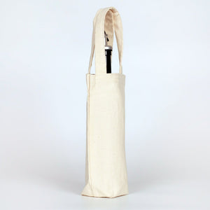 Beige tote bag with a pen inside on a white background